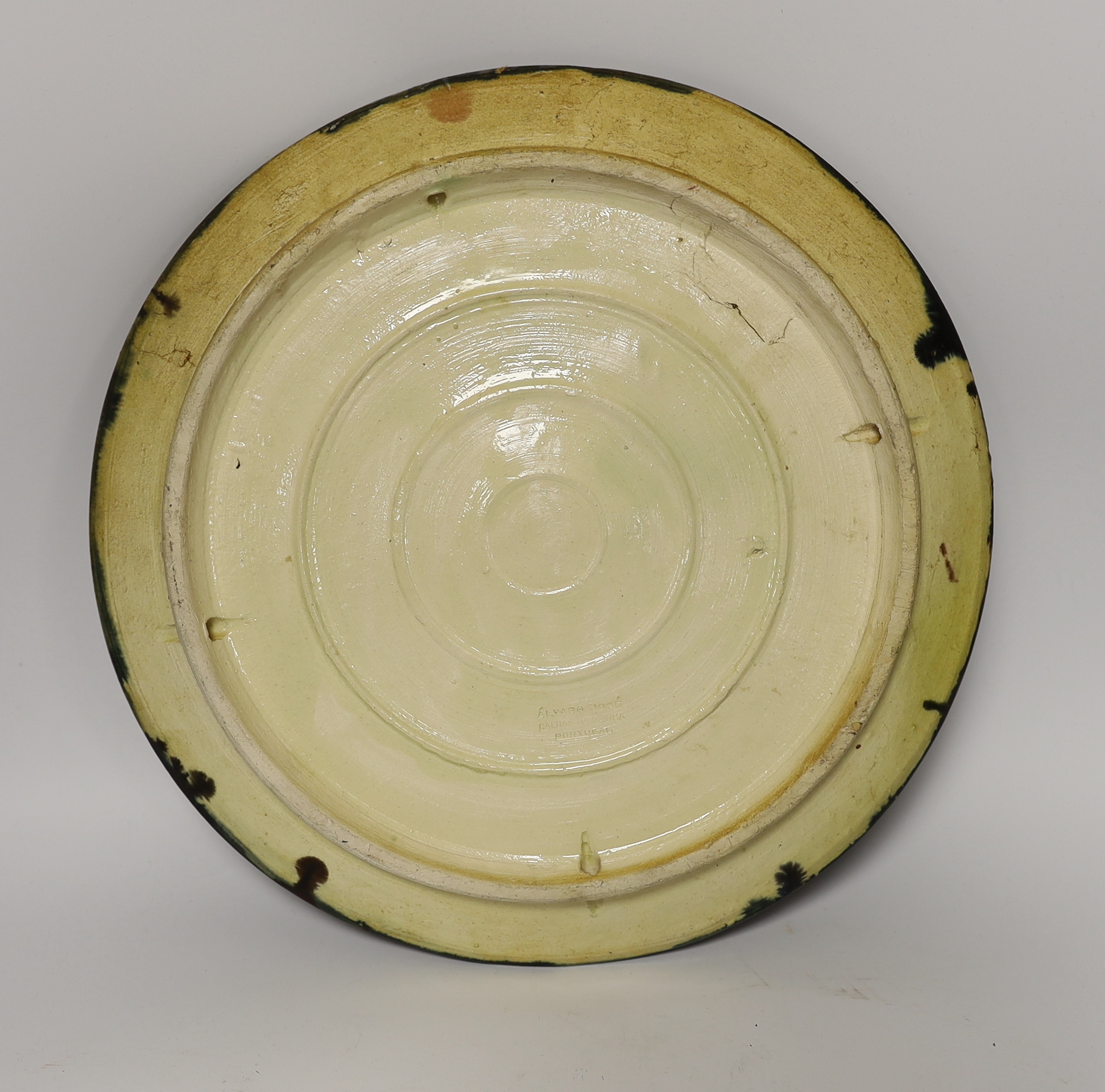 An Alvaro Jose Caldas Da Rainha Palissy ware dish, decorated in relief with a crab and shellfish, stamped to base, 31cm in diameter
